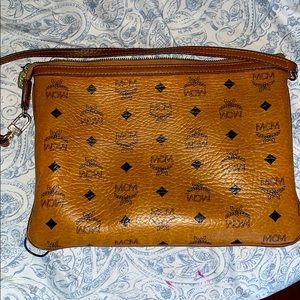 Used MCM clutch bag
